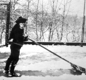 Snow shoveling is part of the fun. Fess Blanchard puts his daughter Molly to work!