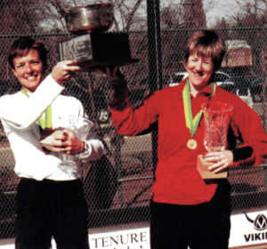 Sue Aery and Gerri Viant accept the trophy for the 2002 Women's Open National
Champions. Moments later, Sue addresses the crowd and announces her
retirement from platform tennis in order to pursue chiropractic school.