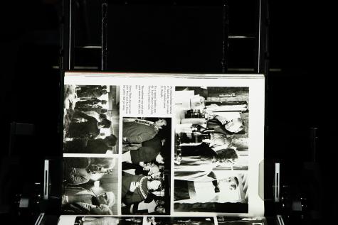 Bartender Paul Berg's selection of libations gives Bob Macy a pause for thought