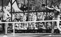 1975 Nationals at Fox Meadow Tennis Club. John Mangan at net and Bob Kingsbury returning an overhead