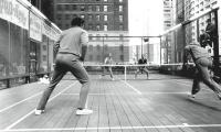 The final of the PRO- Keds Classic outside the Burlington House in Manhattan. Herb Fitz Gibbon and Hank Irvine (foreground), Chum Steele and Keith Jennings. The match was won by Fitz Gibbon & Irvine.