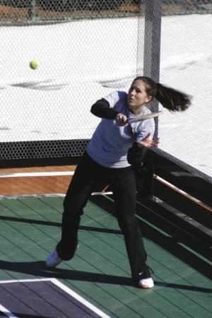 Lauren Zink hitting a winning forehand. Zink and her husband, George, were the first couple to win both the Husband/Wife and Mixed Nationals in the same year - 2006