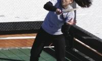 Lauren Zink hitting a winning forehand. Zink and her husband, George, were the first couple to win both the Husband/Wife and Mixed Nationals in the same year - 2006