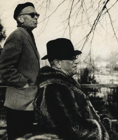 Ken Ward (standing) and Fess Blanchard watch the action at Manursing Island Club.