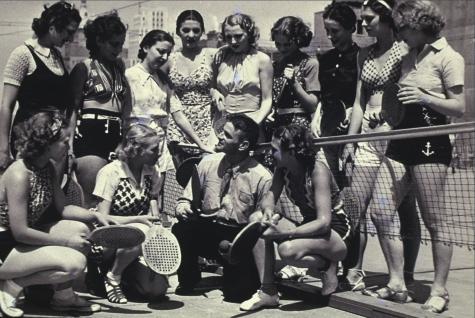 The Radio City chorus is introduced to “paddle” tennis, Atlantic City, 1937.