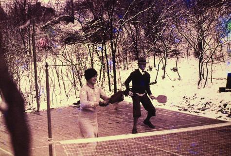 Mary Blanchard, in stylish cloche, teams with left-handed Earle Gatchell on the original Cogswell court