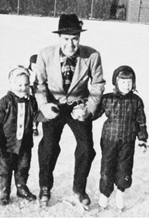 Fred Walker gives Ginny Claiborne and daughter Judy a skating lesson