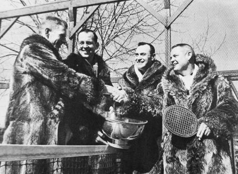 Raccoon was the coat of choice in the early days of the game. Bill Cooper and Jim Gordon winners of 1959 Men's (on left with bowl) and Dick Hebard and Jim Carlisle runners-up.