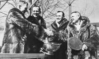 Raccoon was the coat of choice in the early days of the game. Bill Cooper and Jim Gordon winners of 1959 Men's (on left with bowl) and Dick Hebard and Jim Carlisle runners-up.