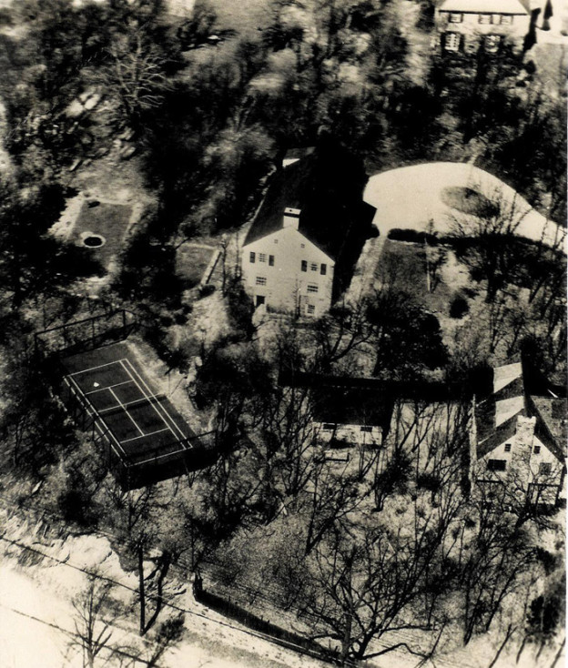 Caption: Aerial view of the second court near Old Army Road in Scarsdale, New York (Oct. 1932). Ardsley Road is shown at bottom. The Cogswell house is at center. The Blanchard house is out of sight at upper left. As shown, only three sides of the original court were screened.