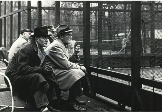 Intently watching the platform tennis action at Fox Meadow Tennis Club