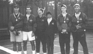 18 and-under winners Patrick and Pat Nowlan from Philadelphia (R) are congratulated by David Kjeldsen and Caryl Swain, as are runners-up Ben and John Holskin, also from Philly.